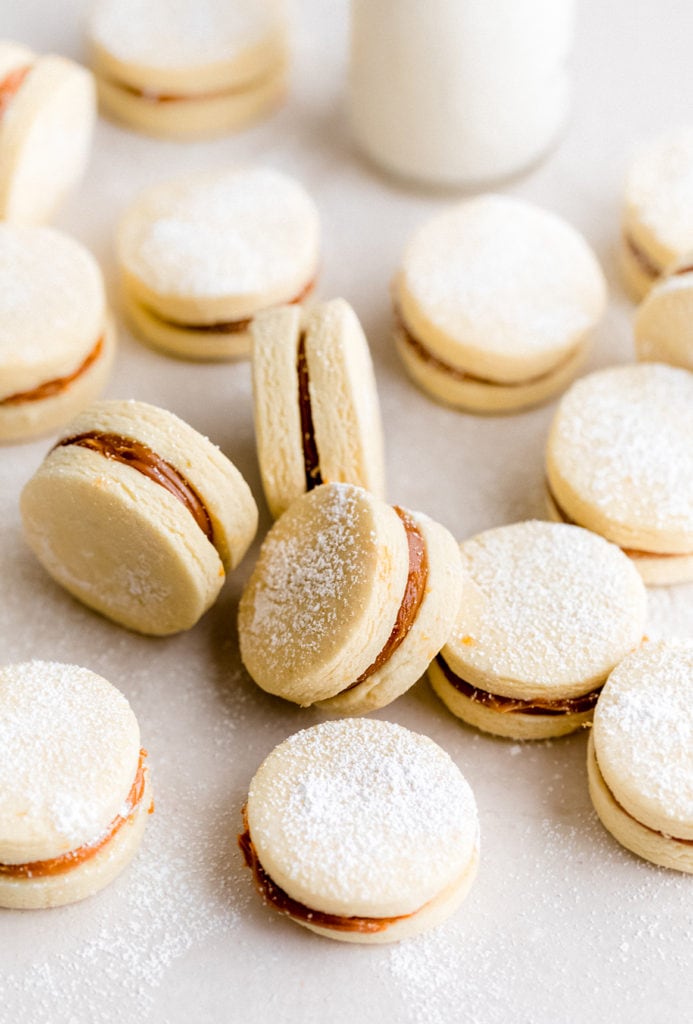 alfajores cookies with dulce de leche and powdered sugar