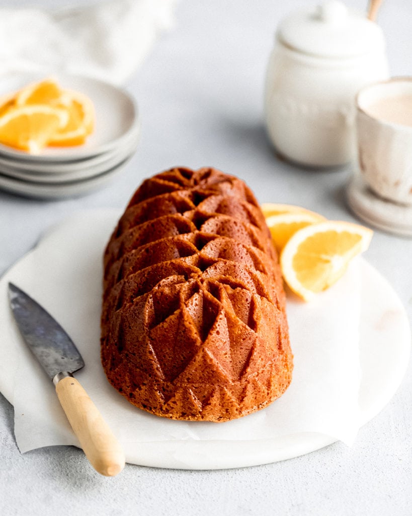 Soft and velvety orange pound cake made with freshly squeeze orange juice and zest. Perfect for a morning snack or brunch dessert.