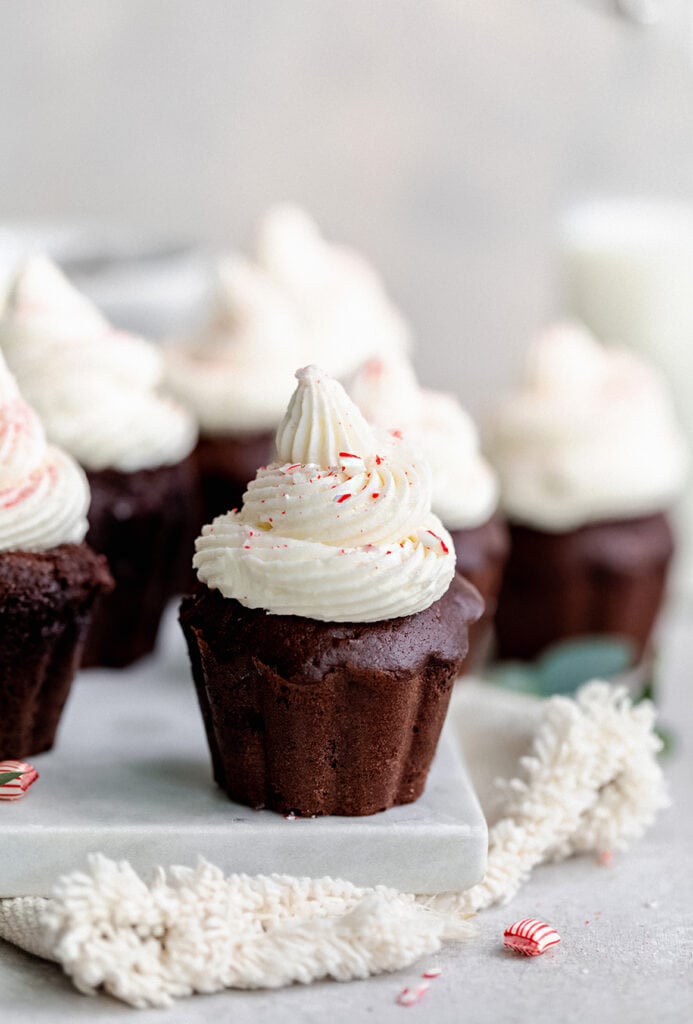 Mexican hot chocolate cupcakes with a holiday twist! Topped with peppermint frosting and infused with CBD oil.