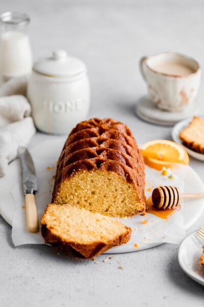 Soft and velvety orange pound cake made with freshly squeeze orange juice and zest. Perfect for a morning snack or brunch dessert.