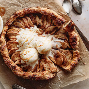 Apple galette with puff pastry, vanilla ice cream and caramel sauce