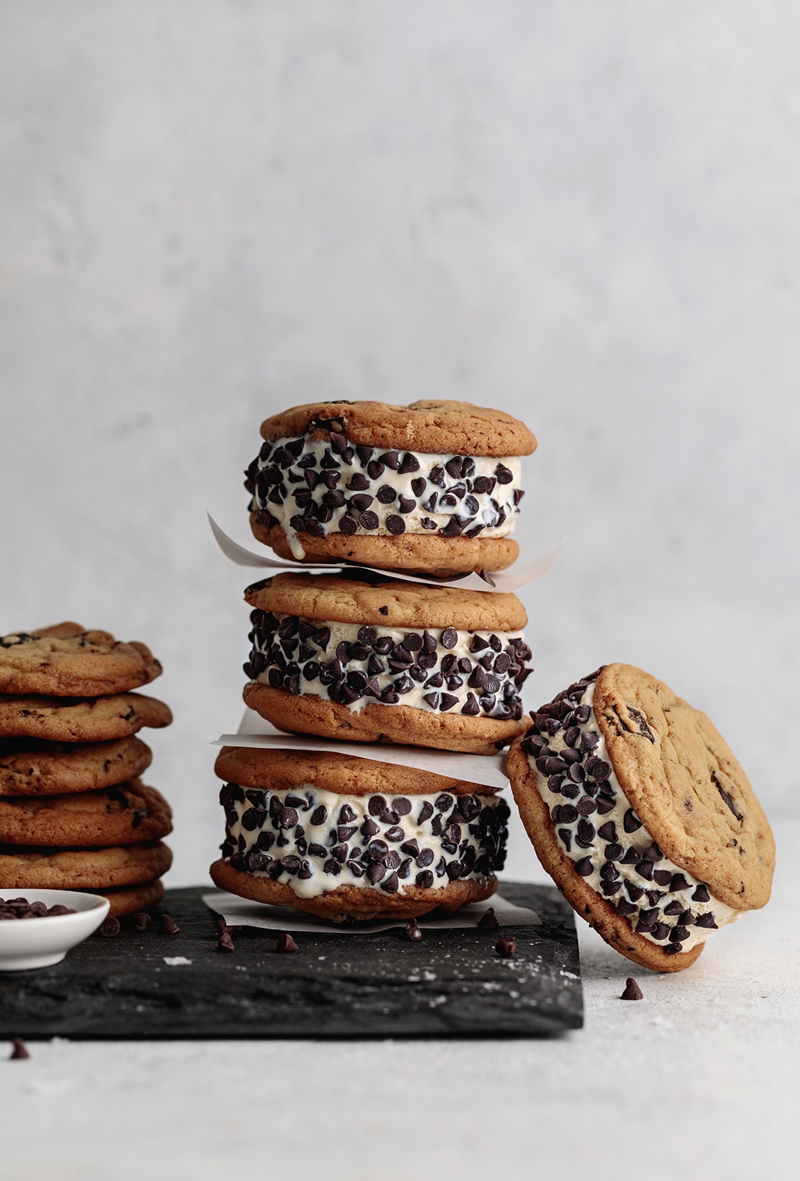 These delicious Vegan Chocolate Chip Cookie Ice Cream Sandwiches are the best of both worlds; soft and chewy cookies, filled with melty ice cream and covered in mini chocolate chips. 