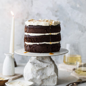 chocolate tahini cake on cake stand