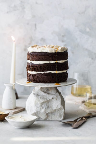 chocolate tahini cake on cake stand