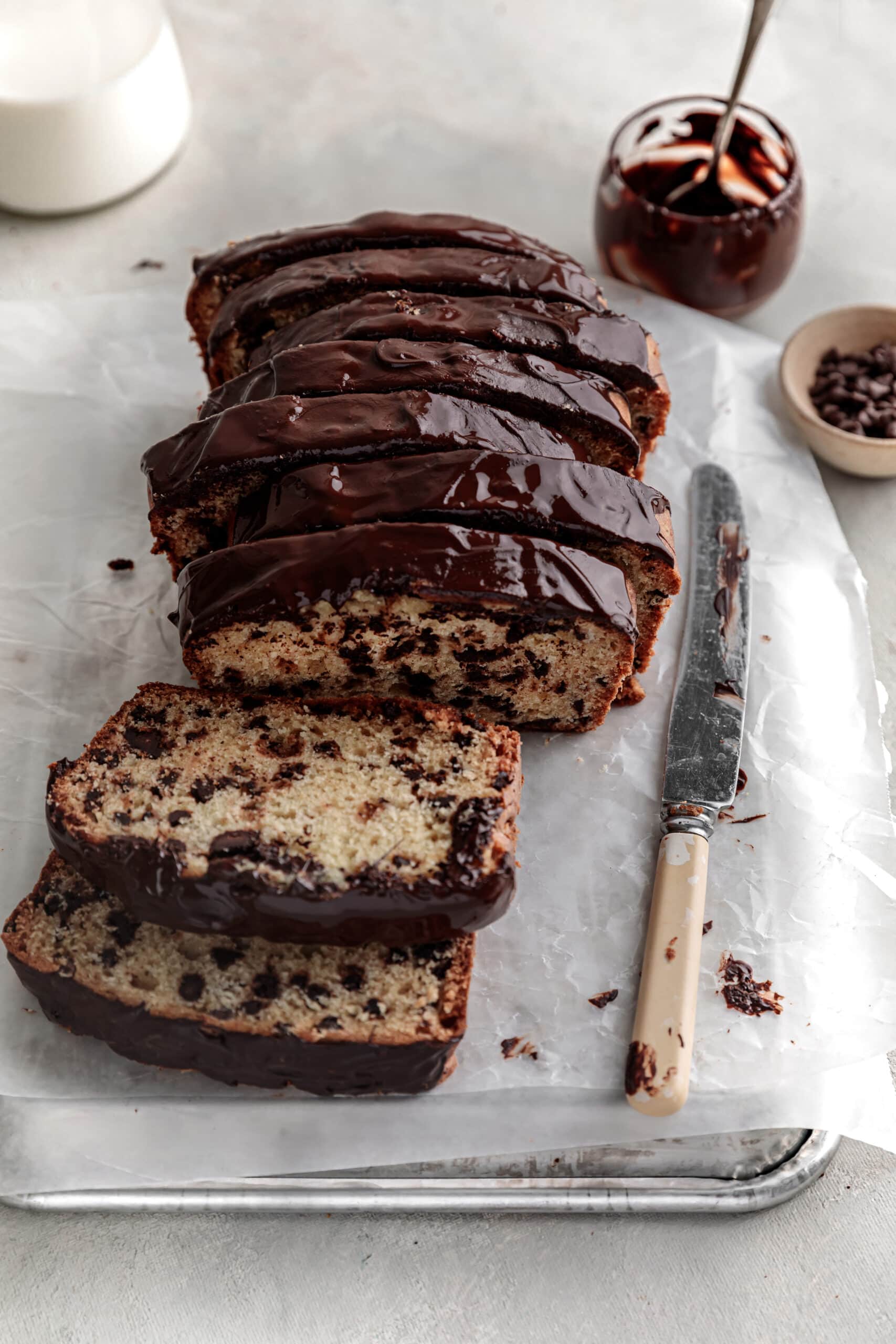 sliced chocolate chip loaf with chocolate ganache