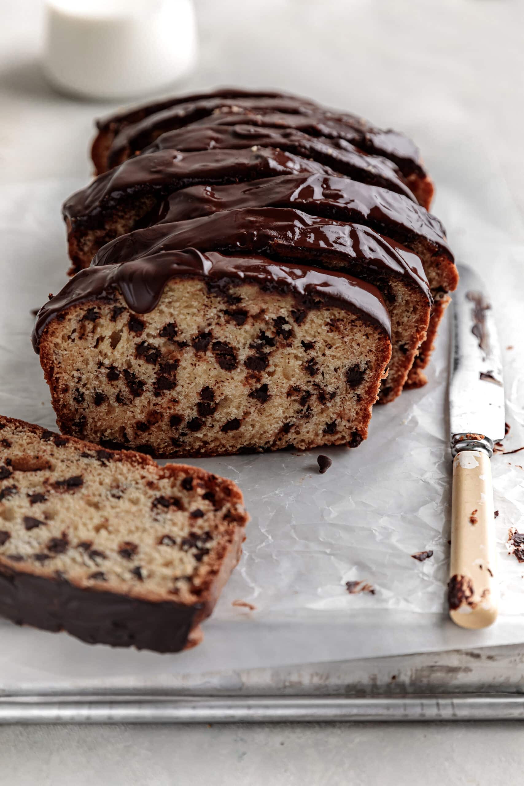 sliced chocolate chip loaf with chocolate ganache