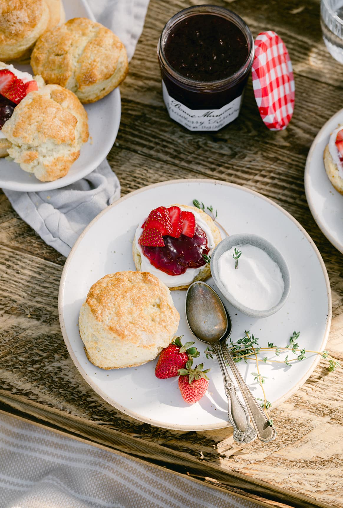 Buttery strawberry shortcakes filled with creamy whipped labneh and strawberry preserves. The perfect dessert to enjoy on an afternoon picnic!