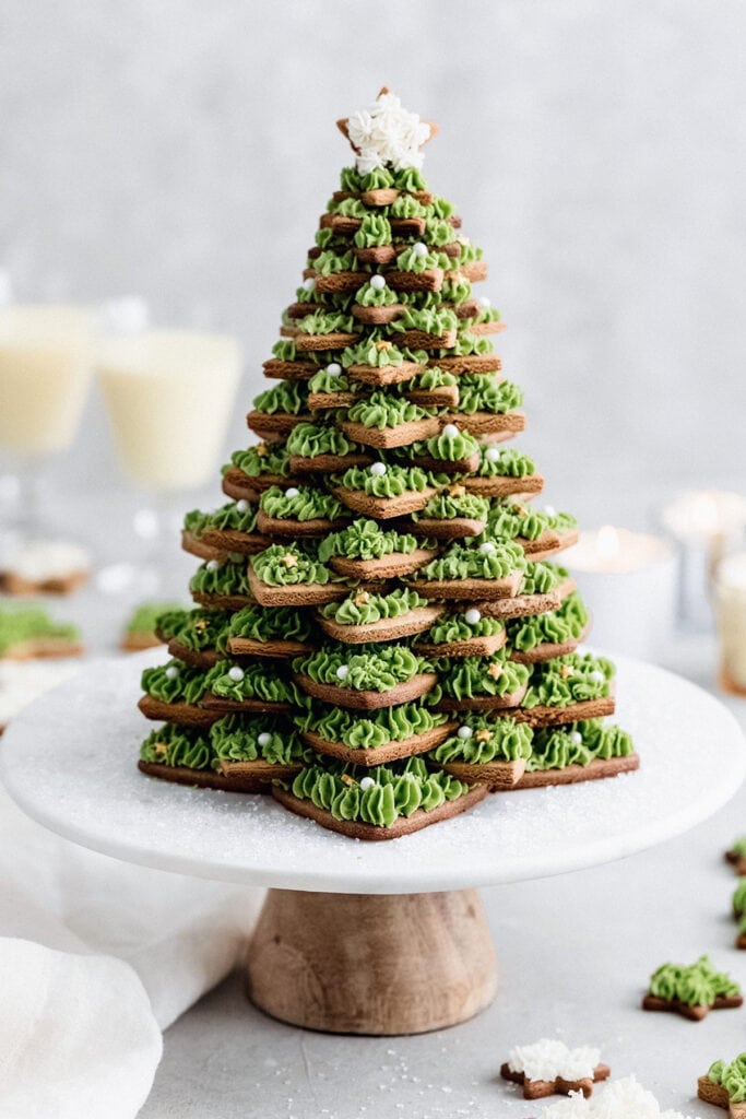 a Christmas cookie tree with gingerbread cookies and buttercream