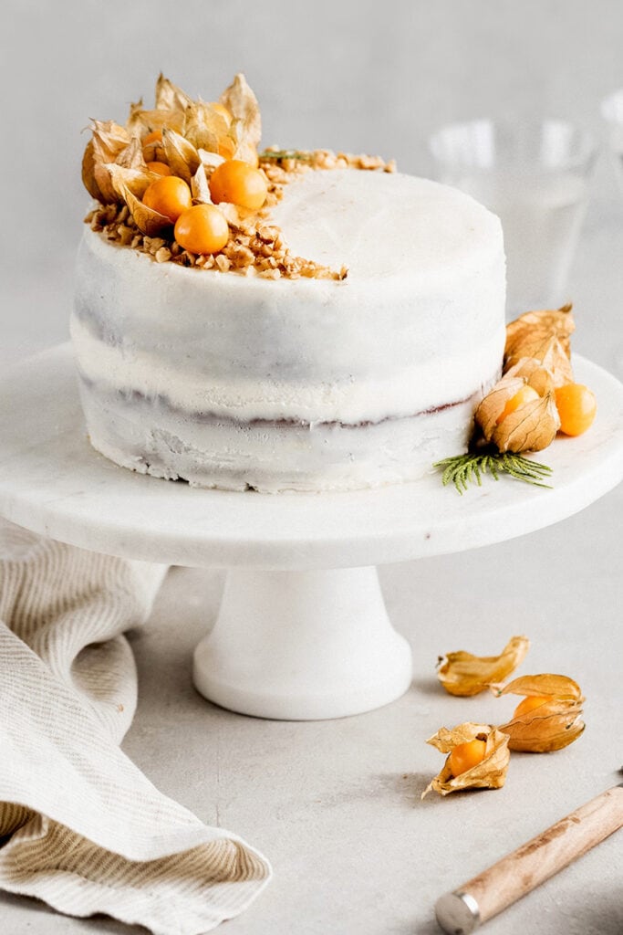 Holiday Fruit Cake (Torta Negra) with macerated fruits and nuts, and covered with brown butter frosting.