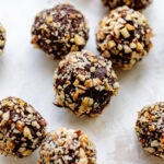 easy chocolate orange truffles covered with chopped nuts
